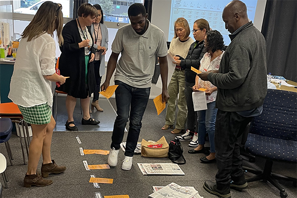 Participants allocating their preferences at an active citizenship workshop with the Sunraysia Ethnic Community Council 